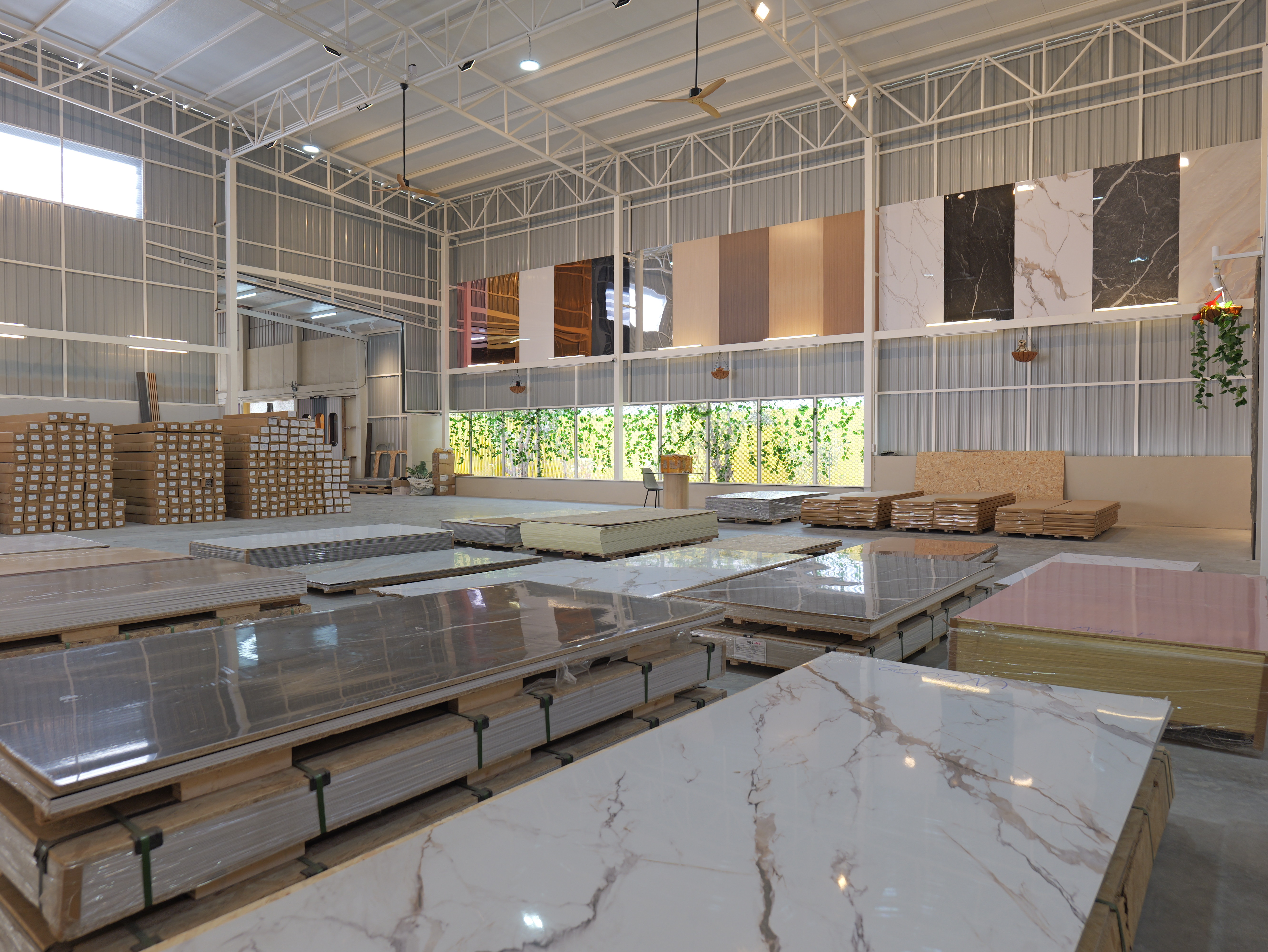 D56 Design Bang Na showroom with marble-finish sheets on pallets and sample wall displays